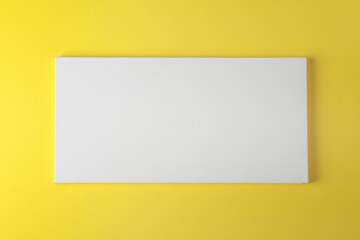 Blank canvas on yellow background, space for text