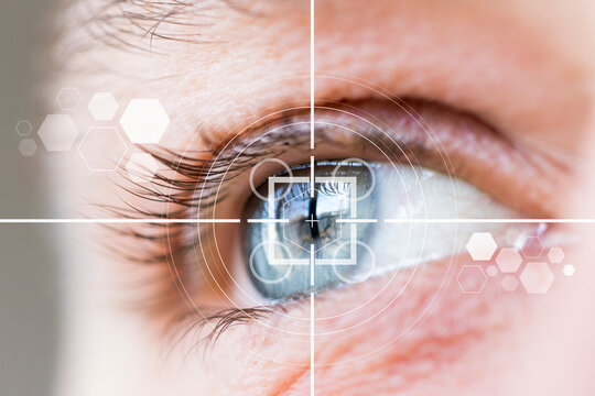 Eye monitoring and treatment healthcare. Biometric scan of male eye closeup.
