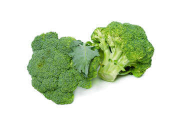 Fresh broccoli lies on a white isolated background. Food photography. Healthy food concept.