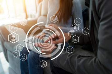business man on network and  using laptop and digital tablet with marketing virtual icon .