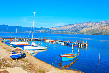 Fototapeta na wymiar Traditional fishing boats, in Aitoliko sea lake in Central Greece