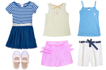 Collage set of little girl summer clothes isolated on a white background. The collection of a blue dress, two shirts, shoes, a pink skirt and white shorts.