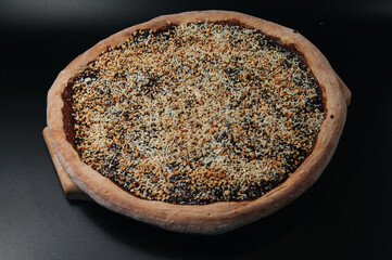 Sweet chocolate pizza with nuts