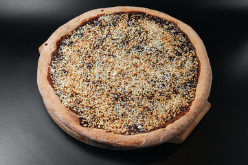 Sweet chocolate pizza with nuts