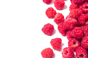 A bunch of ripe raspberries on a white background. Raspberry with copy space for text. Delicious...