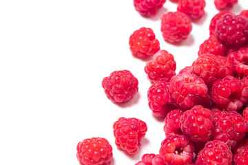 A bunch of ripe raspberries on a white background. Raspberry with copy space for text. Delicious berry