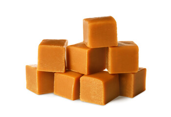 Heap of caramel candies on white background