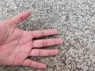sand in hand