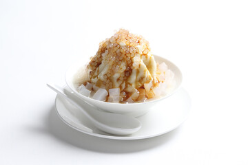 chilled soya pudding jelly with sea coconut sago ice snow kacang and brown sugar syrup in white bowl sweet dessert menu