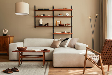 Modern interior of living room with design modular beige sofa, coffee table,  furniture, pendant...