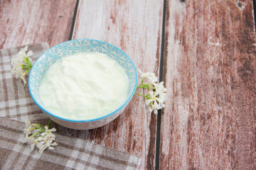 white milk yogurt in a decorative plate