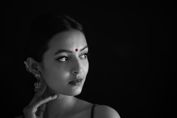 Portrait of a beautiful woman Against Black background