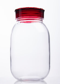 Front View of Glass Jar with Lid Isolated on White Background