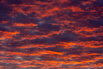 Very intense and colored clouds at sunrise