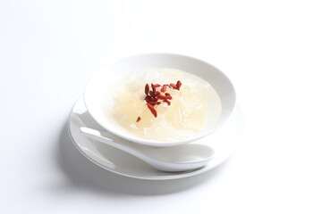 chilled double boiled fresh bird nest with hashima and wolf berries asian sweet soup in white bowl healthy dessert menu