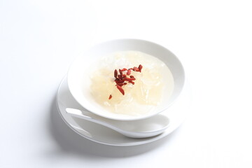 chilled double boiled fresh bird nest with hashima and wolf berries asian sweet soup in white bowl healthy dessert menu