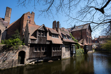 27 April 2021, Bruges, Belgium, walking on medieval Bruges streets in sunny day, travel destination