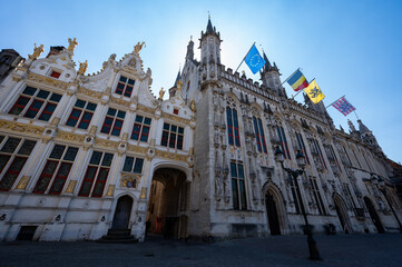 Fototapeta premium 27 April 2021, Bruges, Belgium, walking on medieval Bruges streets in sunny day, travel destination