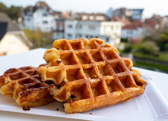 Belgian sugar waffles with black coffee served outdoor