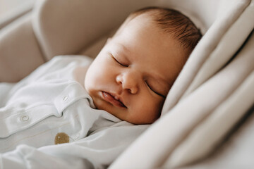 Closeup of a newborn baby sleeping.