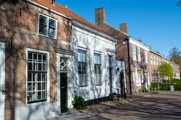 Fototapeta na wymiar City view on old medieval houses in small historical town Veere in Netherlands, province Zeeland