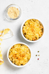 Classic homemade gluten free macaroni and cheese in backing dish.Space for text.