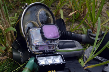 Action-camera  waterproof box and some equipment for free diving