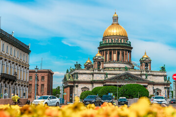 Fototapeta na wymiar Beautiful street panorama and amazing view of St. Isaac's Cathedral in summer. Saint Petersburg, Russia - 05 June 2021 