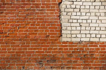 old texture wall made of colored and white bricks, background, grunge