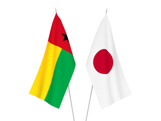 Obraz premium National fabric flags of Japan and Republic of Guinea Bissau isolated on white background. 3d rendering illustration.