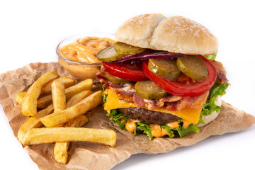 Beef burger with cheese, bacon and french fries isolated on white background