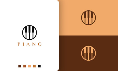 circle piano logo in simple and modern style suitable for pianist or music studio © Murnifine
