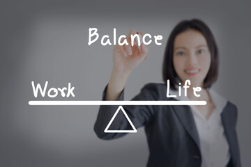 businesswoman balance his work and life on board tip. concept.