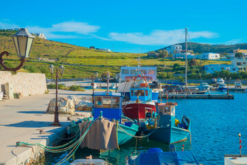 Fototapeta na wymiar Greece Santorini island in Cyclades, Ammoudi village with fishing boats