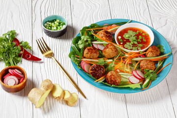 Vietnamese banh mi salad with meatballs, top view