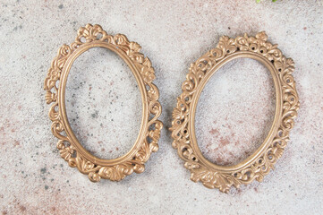 Two antique brass picture frames