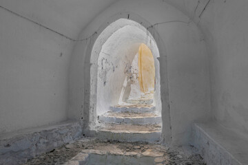 Naklejka premium Greece Santorini island in Cyclades, traditional view of white washed houses with colorful wooden frames