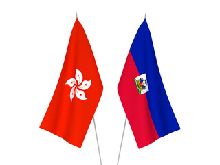 National fabric flags of Hong Kong and Republic of Haiti isolated on white background. 3d rendering illustration.