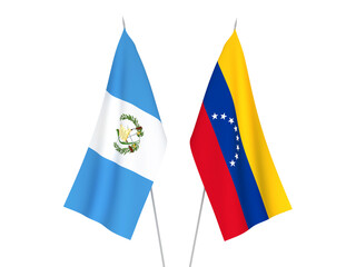 National fabric flags of Republic of Guatemala and Venezuela isolated on white background. 3d rendering illustration.