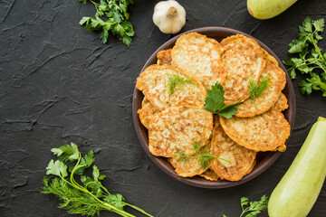 A healthy breakfast of zucchini pancakes. Creative atmospheric decoration