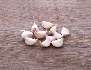 Pile of white garlic heads top view. Raw garlic background. Whole garlic heads, texture
