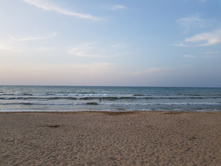 Fototapeta na wymiar Sunset on the beach of the Caspian Sea