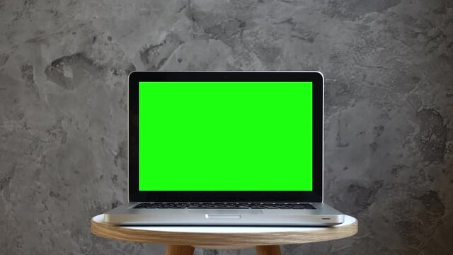 Laptop mockup screen background. Empty computer screen on desktop in the interior of a home room or business office