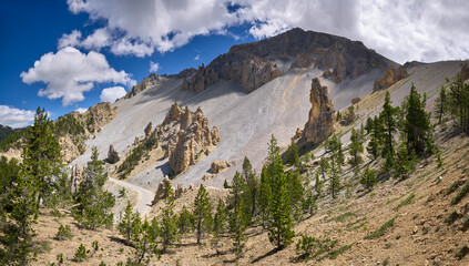 Queyras Natural Regional Park. Geologic rock formation of Casse Deserte near Arvieux, on the Col d'Izoard famous road (D902), with its stone towers. Hautes-Alpes, French Alps, France