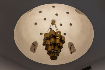 Decorative chandelier in arabic style hanging from the ceiling , Egypt