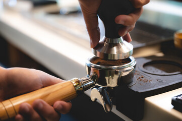 professional barista making espresso coffee to a drink cup in cafe, beverage caffeine machine, person pouring hot water with hand, business in the morning breakfast, fresh aroma in hot drink