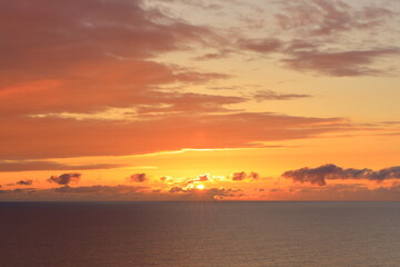Naklejka na ściany i meble Sunrise over the north sea on the Yorkshire coast.