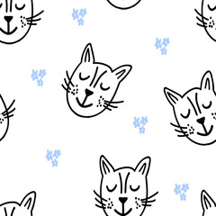 Seamless vector pattern with handdrawn cute cat heads and blue flowers,kids illustration for interior design,textile, wallpaper,animal print for baby fashion,wildlife background,world cat day