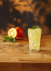 Cold drink on wooden table and free space for your decoration. 