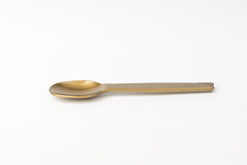 plastic spoon on a white background